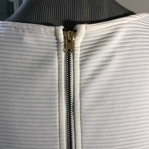 Striking Architectural Peplum Top - Picture 7 of 10